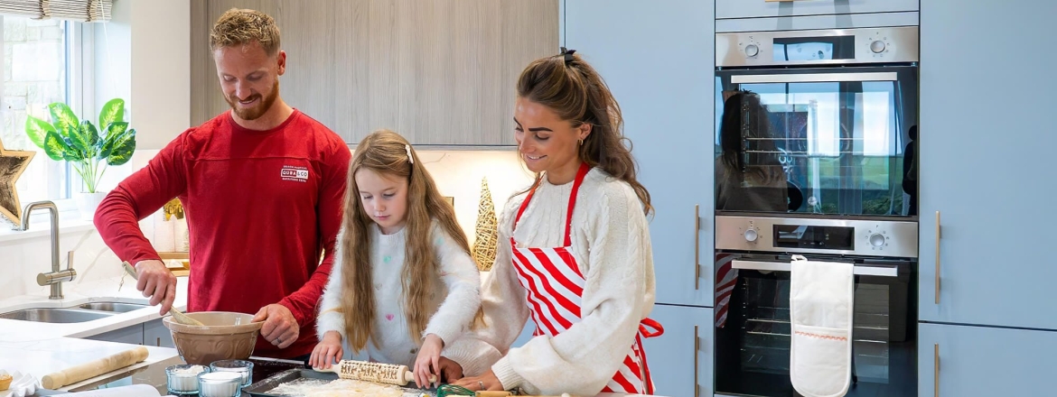 Christmas At Devonshire Homes Family Baking In Kitchen