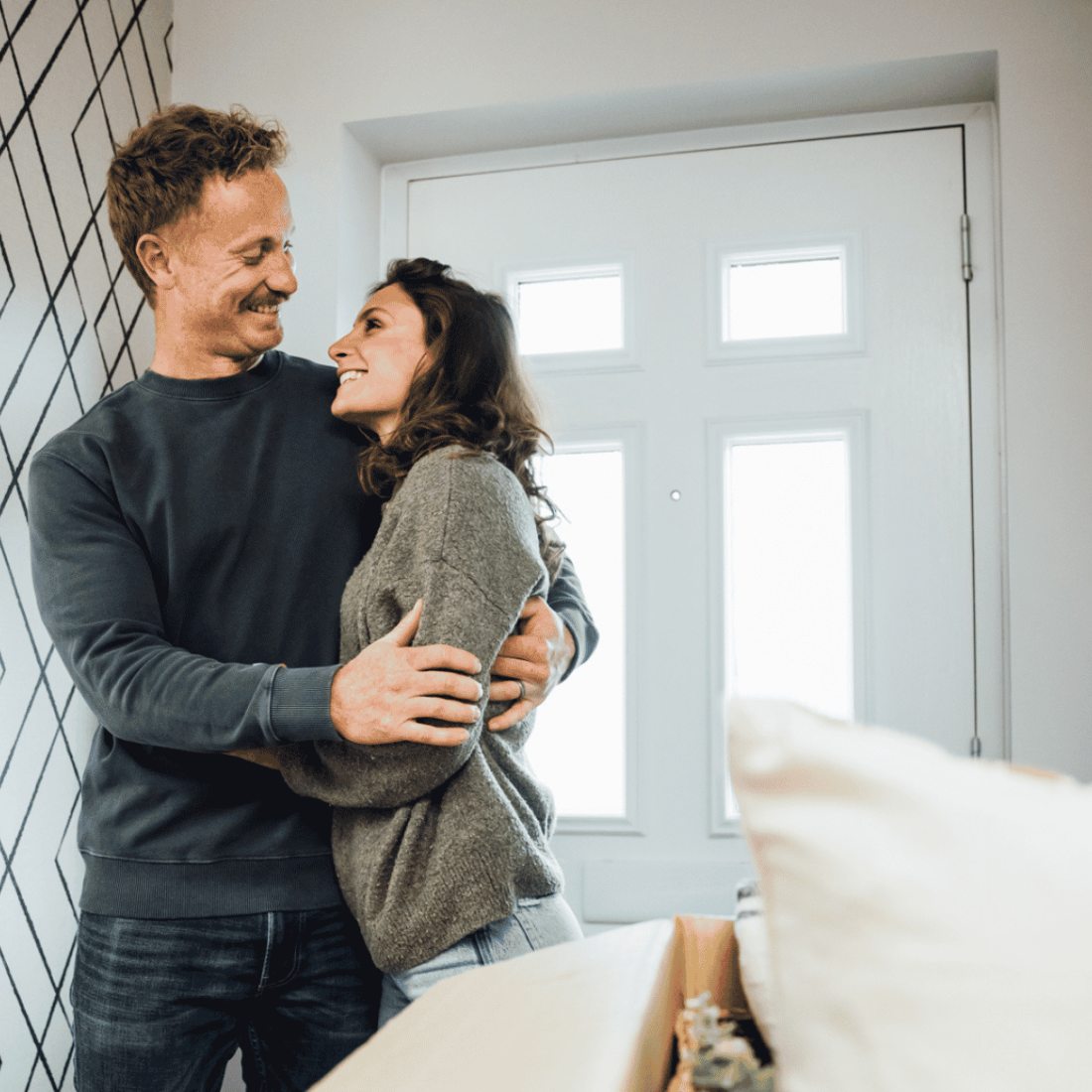 A Couple Hugging In A Devonshire Homes