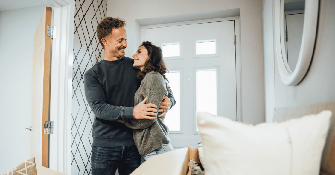 A Couple Hugging In A Devonshire Homes